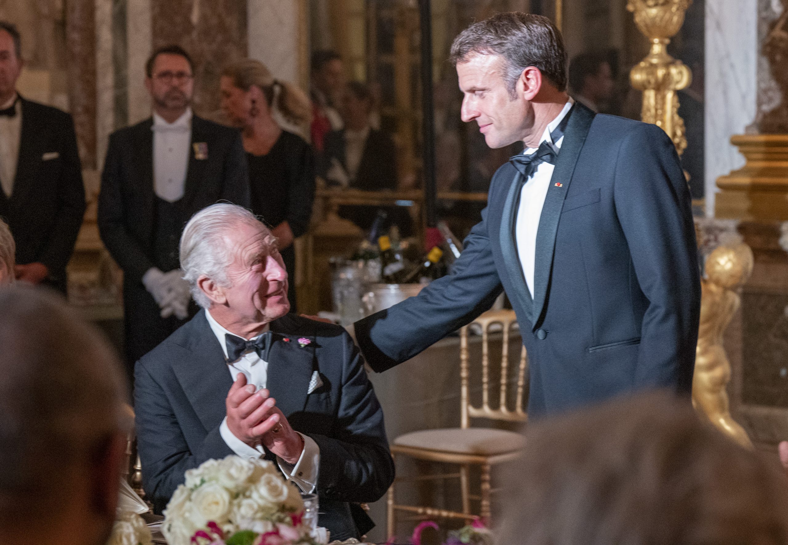 cena versalles macron carlos III