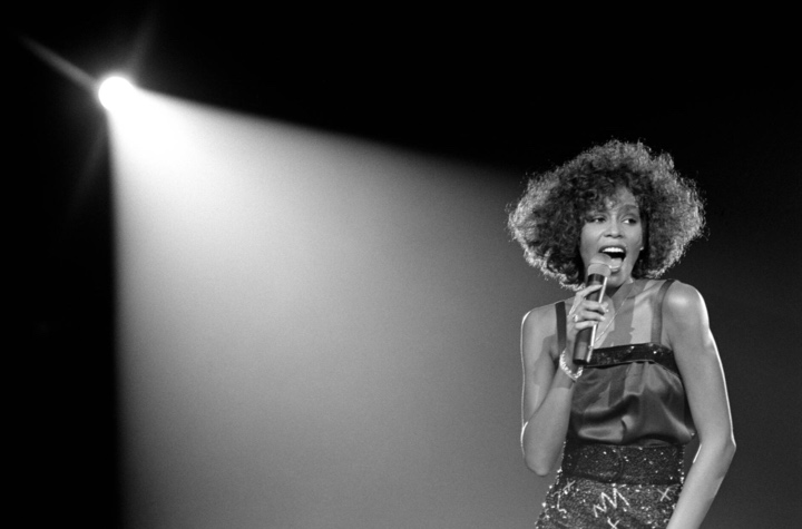 Whitney Houston performing at Wembley Arena, London 5 May 1988. © Photograph © David Corio