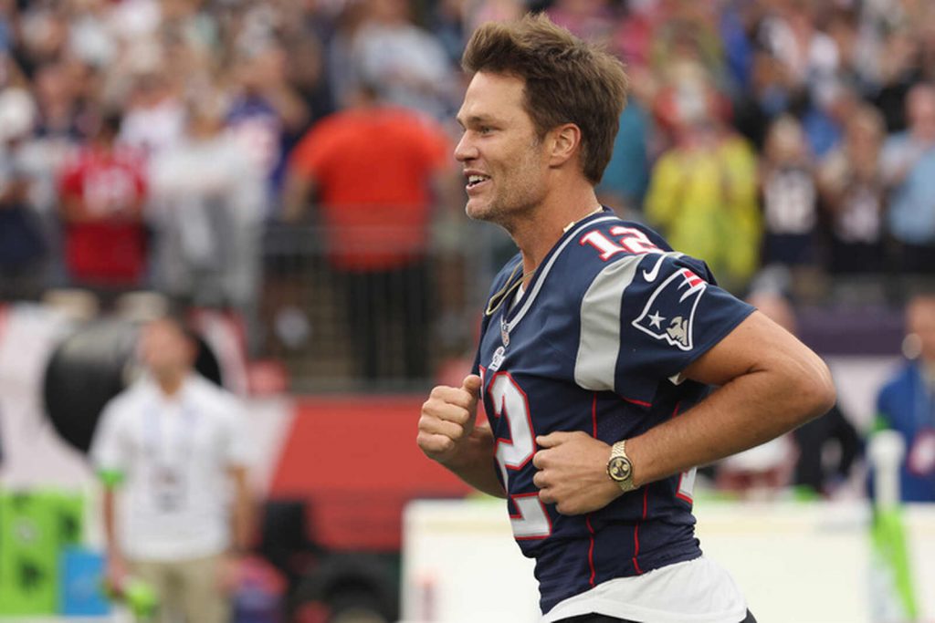 Tom Brady corriendo con Rolex John Player