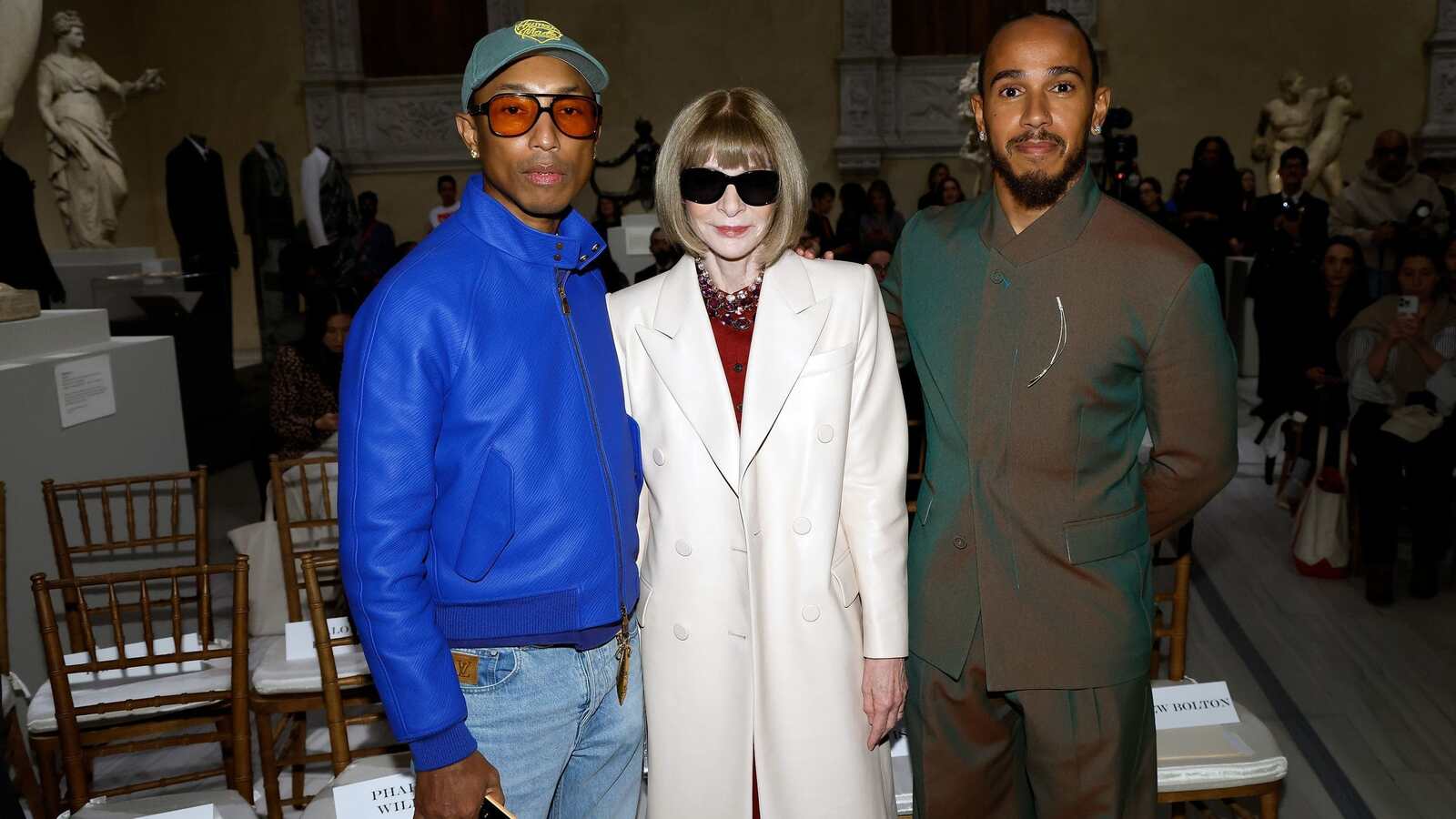 Pharrell, Anna Wintour y Lewis Hamilton posando