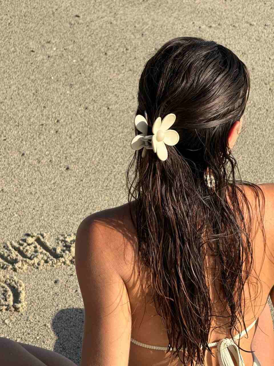 recogido pinza pelo verano