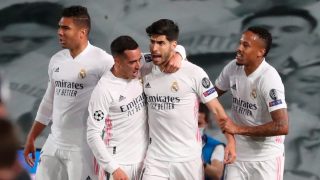 El Real Madrid celebra el gol de Asensio ante el Liverpool (EFE).