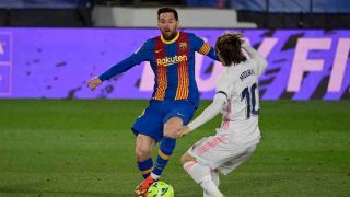 Messi y Modric. (AFP)