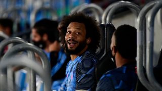 Marcelo, en el banquillo durante un partido del Real Madrid. (AFP)