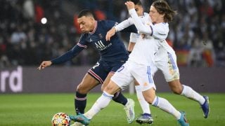 Modric y Mbappé, durante un partido.