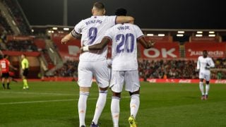 Benzema y Vinicius celebran un gol. (AFP)