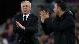 Ancelotti y Xavi en el Clásico. (AFP)
