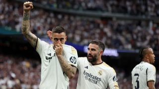 Joselu Mato celebra un gol con el Real Madrid junto a Dani Carvajal. (Getty)