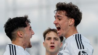 Hugo de Llanos y Fortea celebran un gol. (Realmadrid.com)