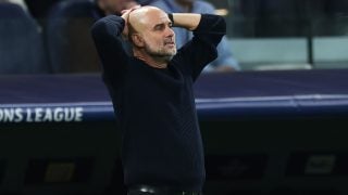 Guardiola, en un partido ante el Real Madrid en el Bernabéu. (Getty)