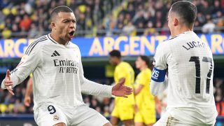 Mbappé celebra un gol con Lucas Vázquez. (Getty)