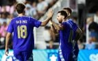 Leo Messi celebra junto a Nico Paz un gol ante Puerto Rico.