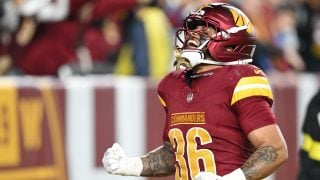 Chris Rodriguez Jr. celebra un touchdown con los Washington Commanders ante los Lions. (Getty)