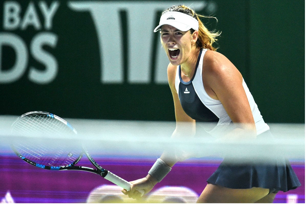 Garbiñe Muguruza celebra uno de los puntos conseguidos en el partido ante Radwanska. (AFP)