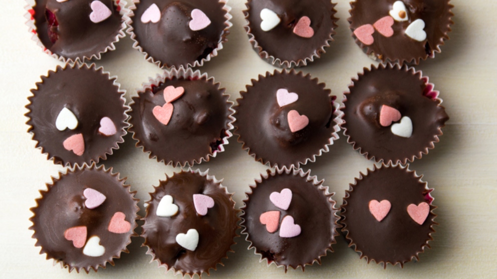 homemade chocolate with decorative hearts on a table