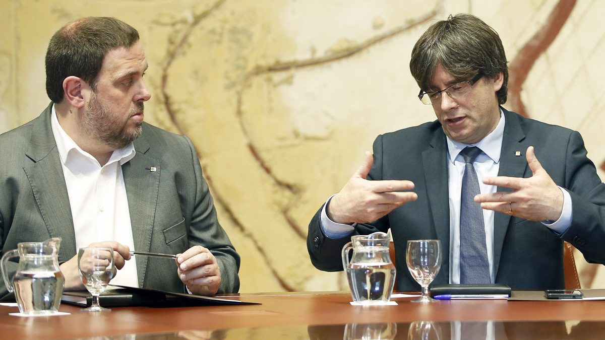 Oriol Junqueras y Carles Puigdemont. (Foto: EFE)