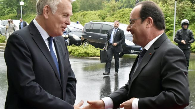 Ayrault y Hollande en un reciente acto conjunto. (Foto: AFP)