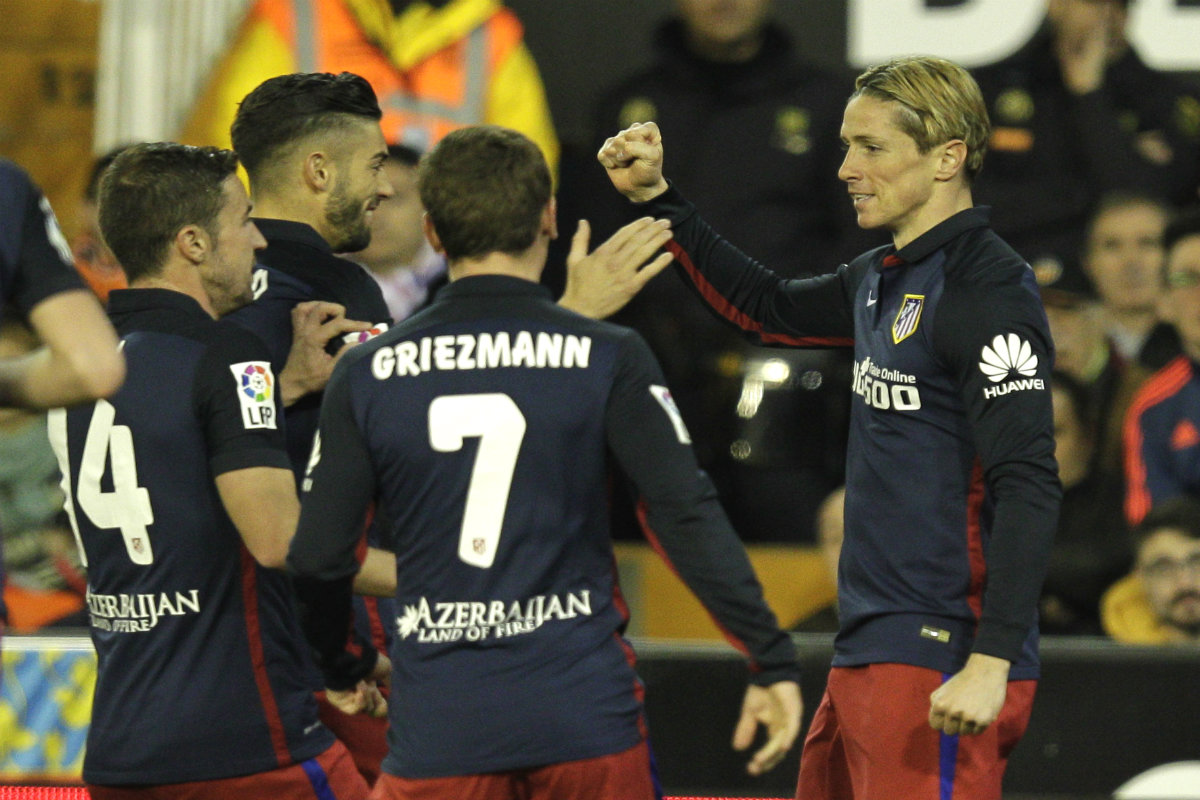 Griezmann, Gabi, Carrasco y Torres celebran el gol de El Niño. (AFP)