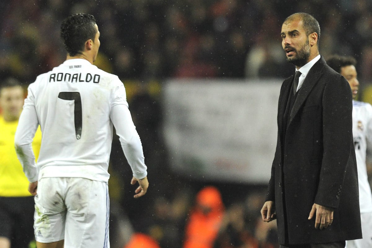 Cristiano y Guardiola, en un Clásico en el Camp Nou. (AFP)