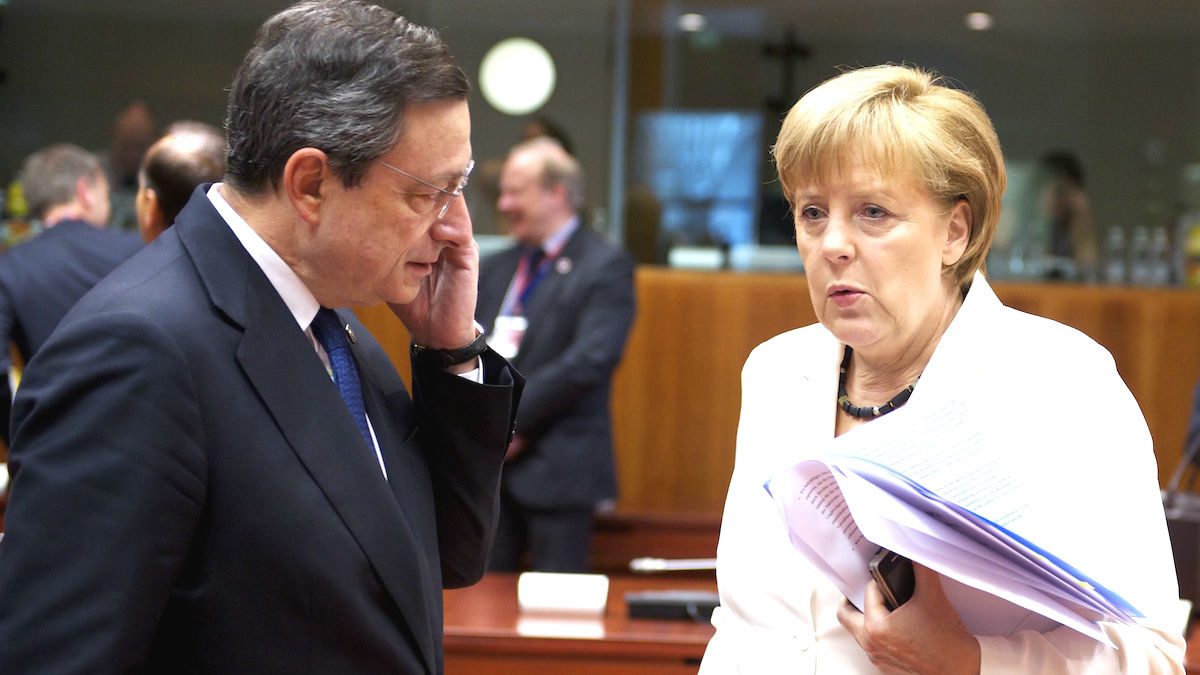 Mario Draghi y Angela Merkel.