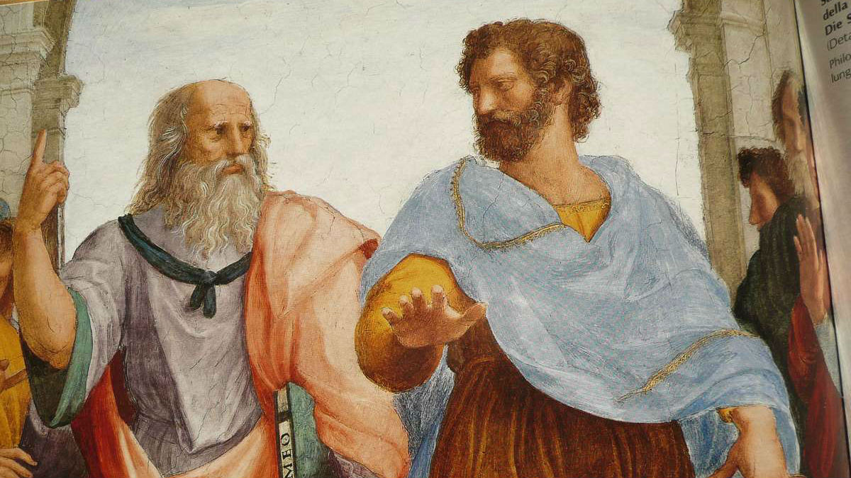 Aristóteles y Platón retrados por el artista renacentista Rafael en La Escuela de Atenas. (Foto: Getty)