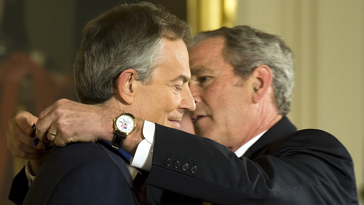 Tony Blair y George Bush. (Foto: AFP)