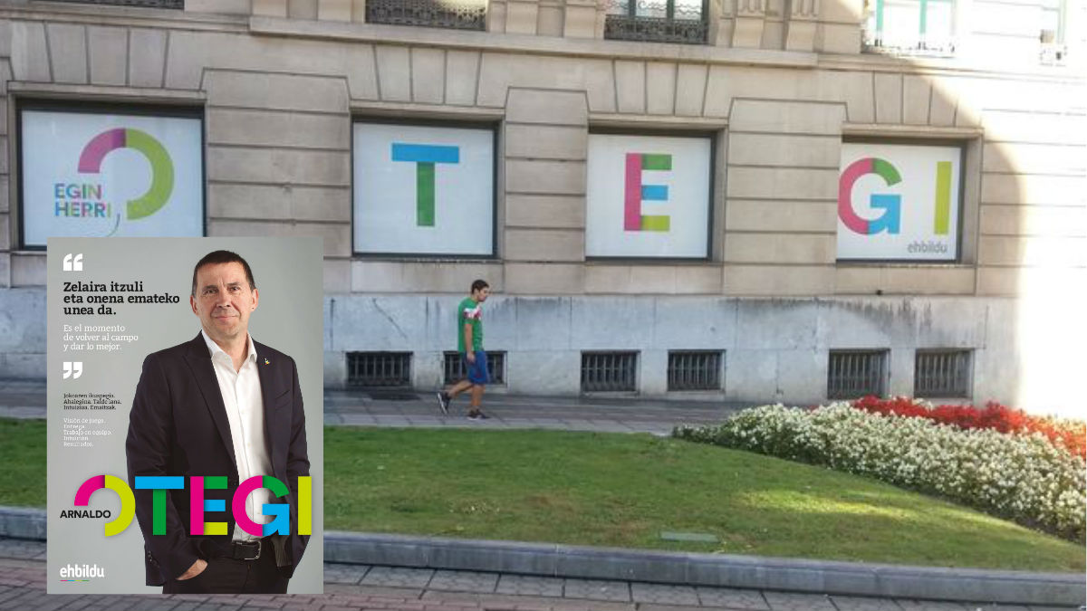 Las ventanas de la sede de EH Bildu en Bilbao esta mañana. Y el cartel de EH Bildu. (Foto: Agencias)