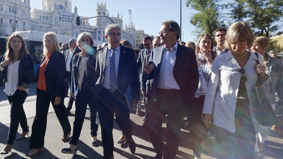 Francesc Homs y su ‘comitiva’ por Madrid. (Foto: EFE)