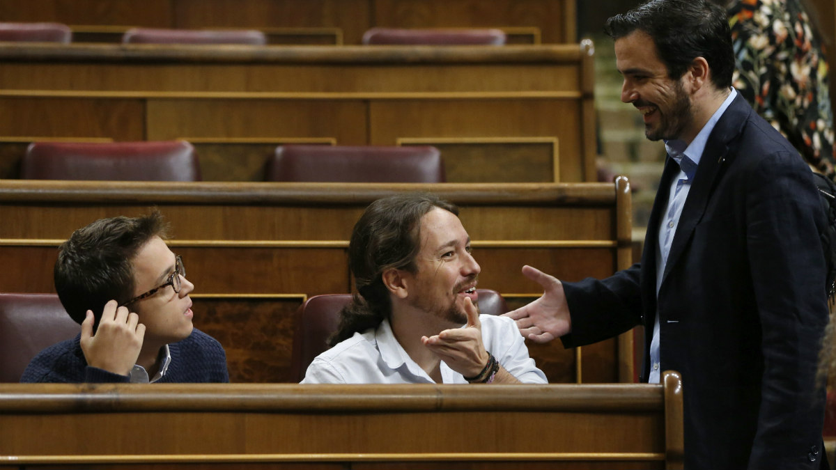 Iñigo Errejón, Pablo Iglesias y Alberto Garzón en el debate de investidura de Rajoy (EFE).