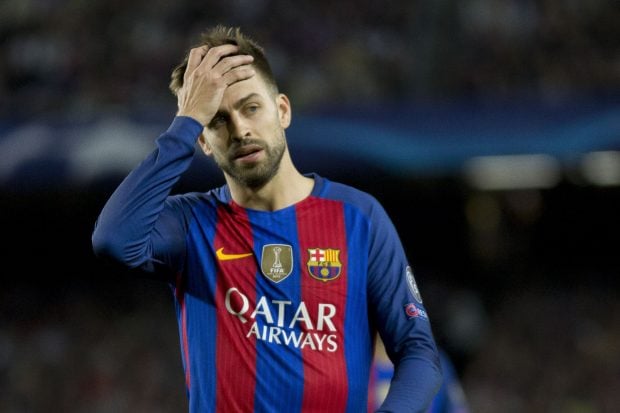 Gerard Pique, al lesionarse ante el Manchester City. (Getty)