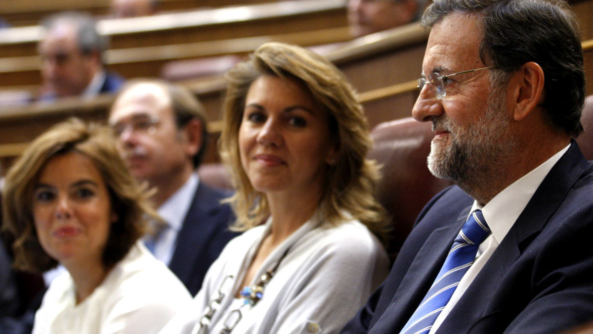 Soraya Sáenz de Santamaría, Dolores de Cospedal y Mariano Rajoy, en el Congreso de los Diputados.