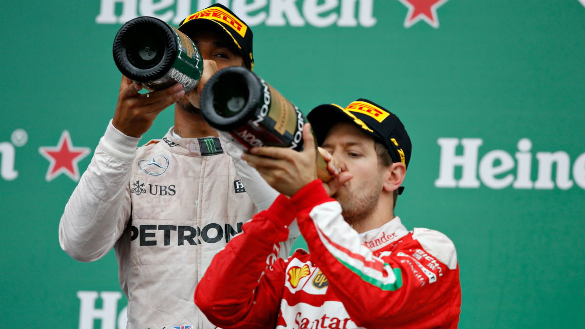 Hamilton y Vettel, en el podio. (Getty)