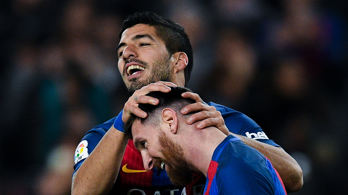 Luis Suárez y Messi, celebrando uno de los goles ante el Espanyol.