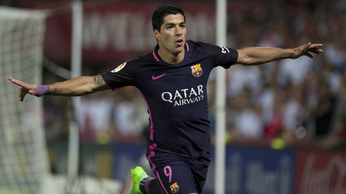 Luis Suárez celebra el primer gol del Barcelona. (AFP)