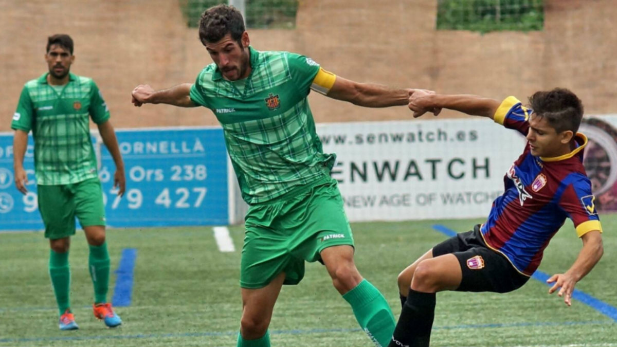 Cornellà y Eldense durante un partido. (uecornella.cat)