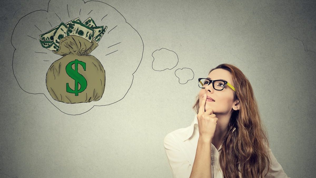 Woman dreaming of financial success