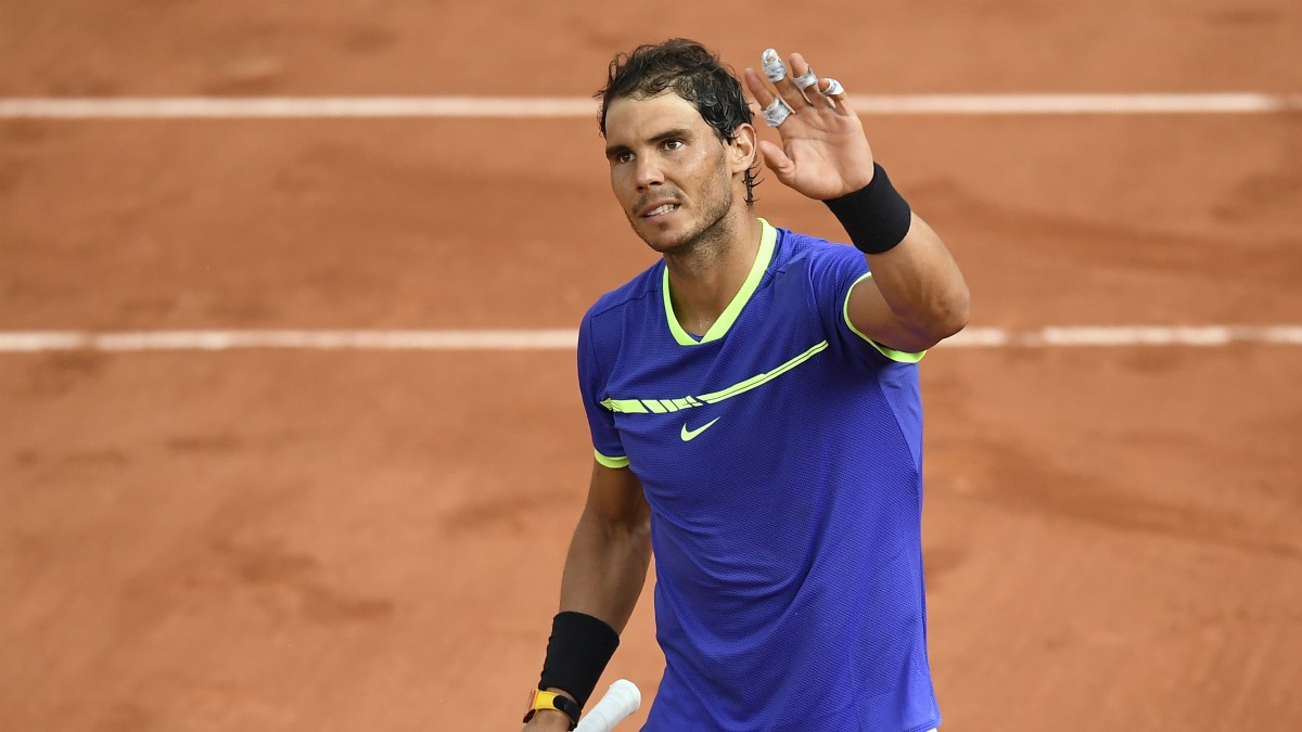 Nadal saluda al público tras una victoria. (Foto: AFP)