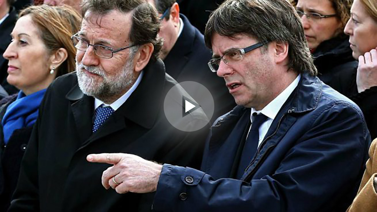 Mariano Rajoy y el presidente de la Generalitat, Carles Puigdemont,  en el homenaje a las víctimas del siniestro del vuelo Germanwings 9525. (Foto: EFE)