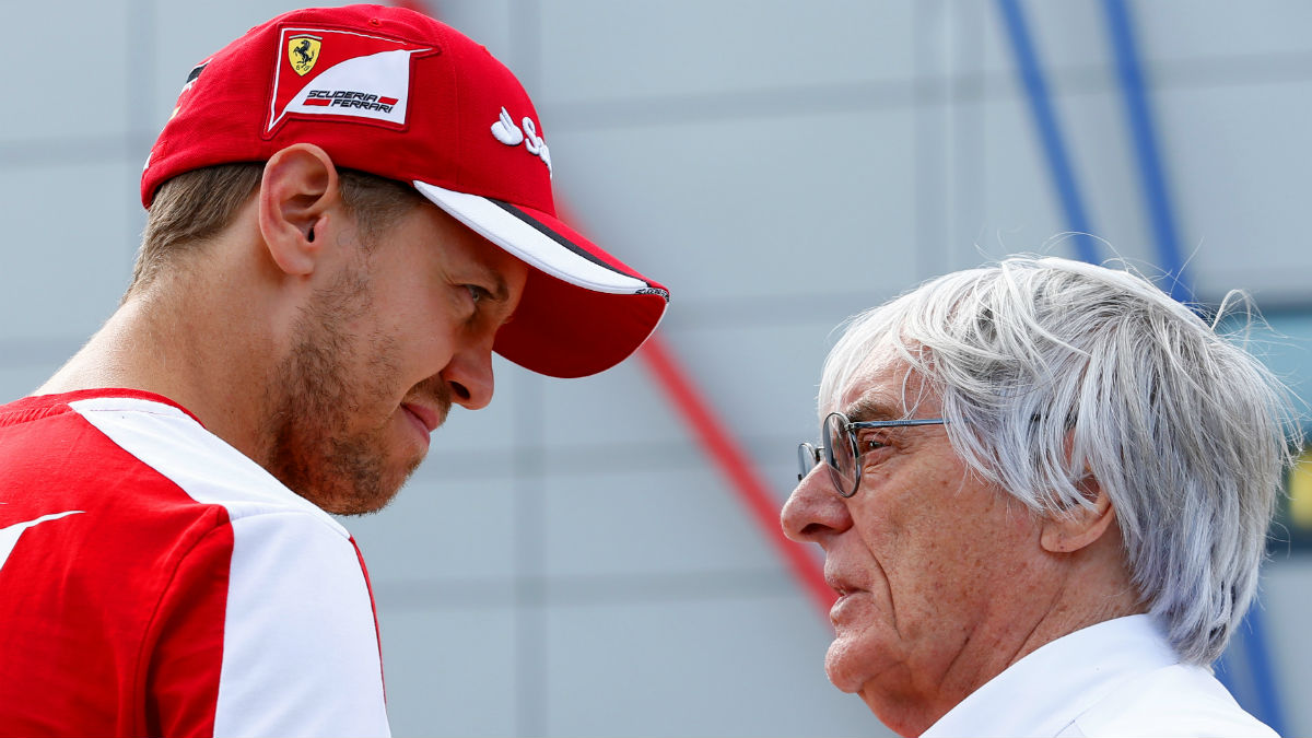 Ecclestone dialoga con Sebastian Vettel. (Getty)