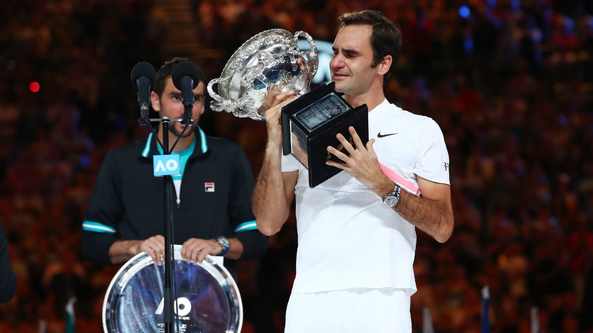 Roger Federer levanta emocionado su vigésimo Grand Slam. (Getty)