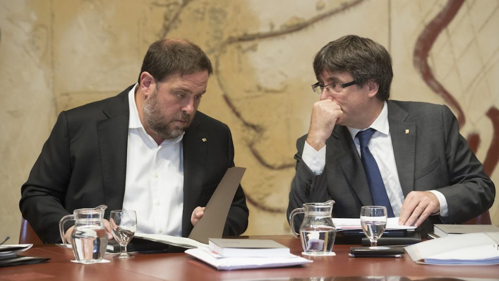 Oriol Junqueras y Carles Puigdemont, en una reunión del Govern antes del 1-O..