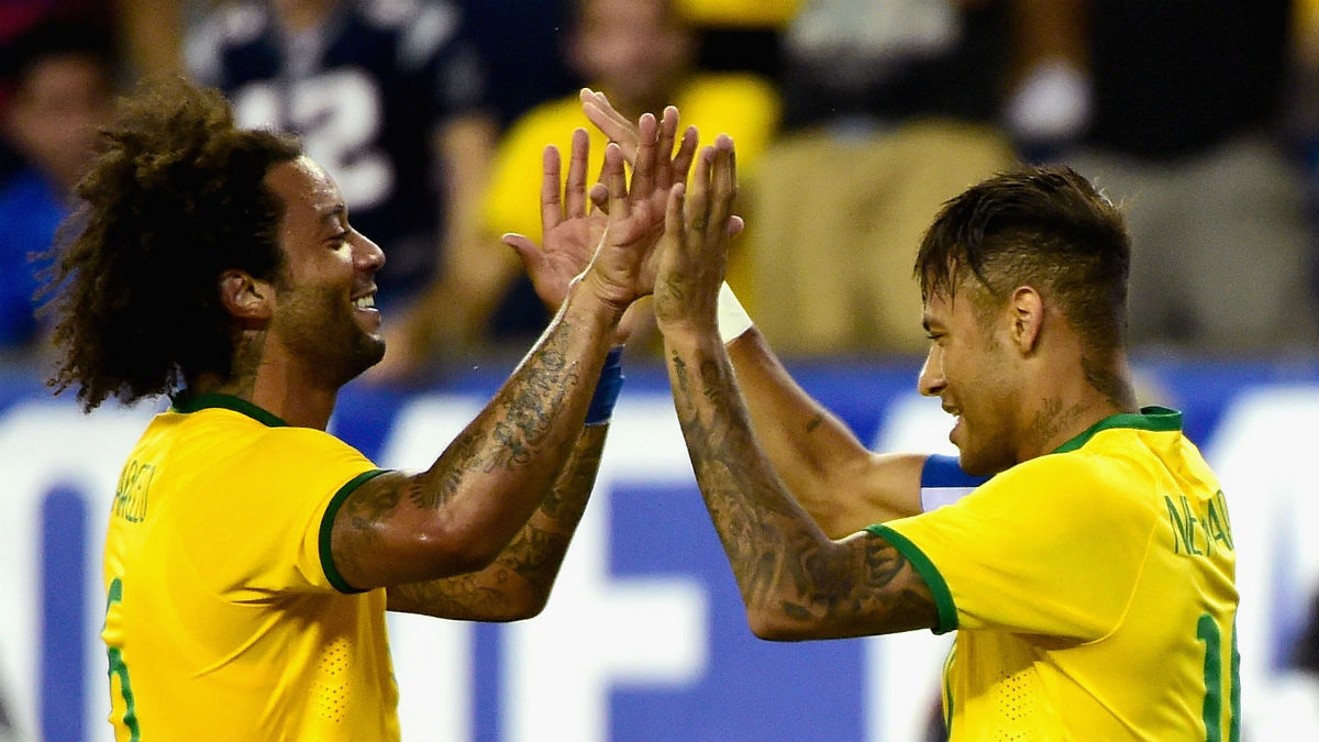 Neymar y Marcelo durante un partido con Brasil. (AFP)