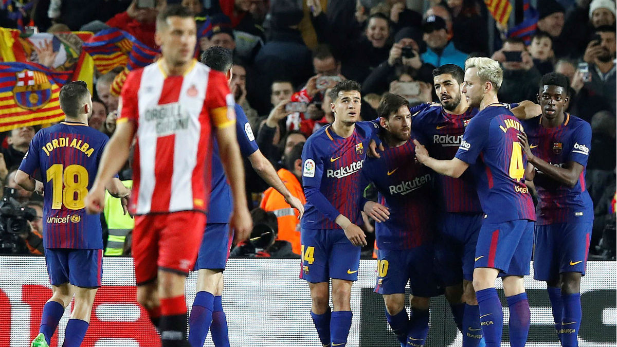 Los jugadores del Barça celebran uno de los goles de su festival ante el Girona. (EFE)
