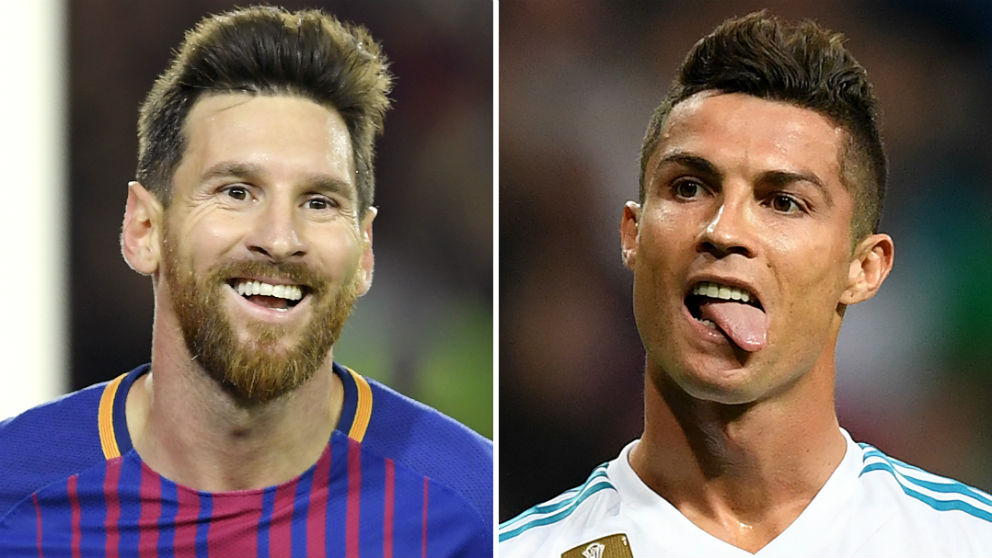 Leo Messi y Cristiano Ronaldo. (AFP)