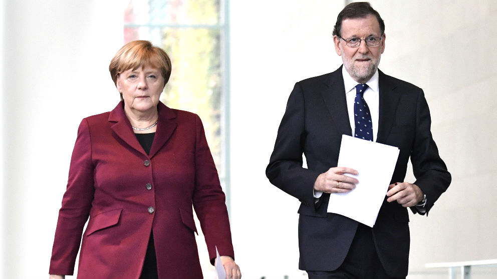 Merkel y Rajoy en una imagen de 2017 (Foto: AFP).