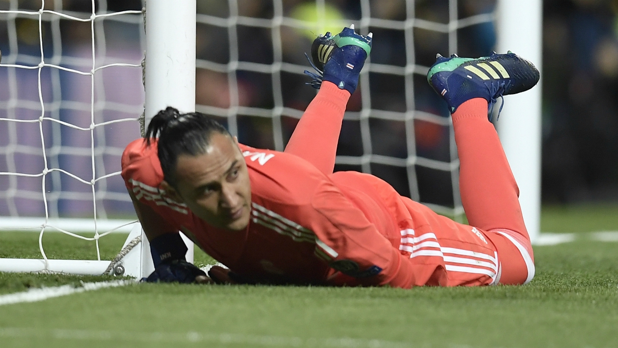 Keylor Navas, en el suelo tras uno de los goles de la Juventus. (AFP)