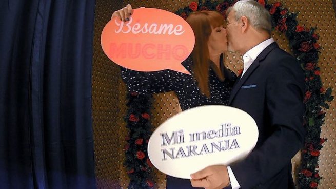 Patricia y Carlos se besan en el photomaton