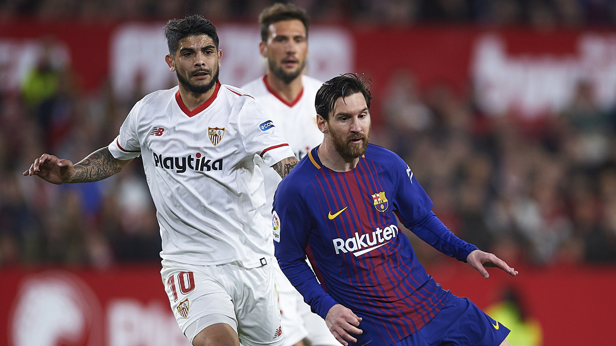 Ever Banega y Leo Messi durante un Sevilla – Barcelona. (Getty)