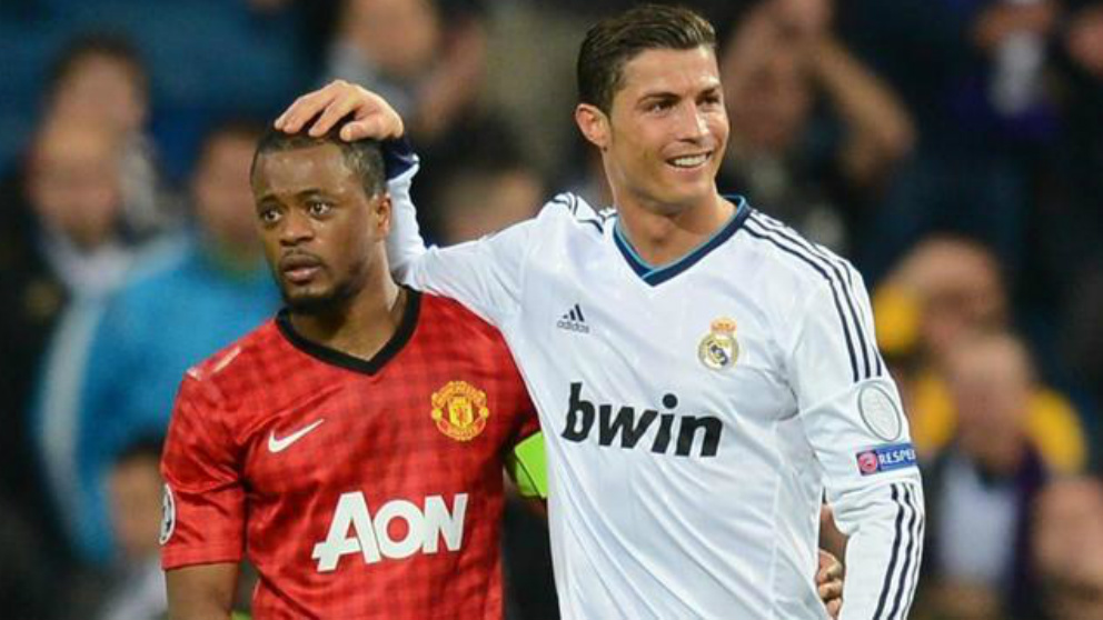 Evra y Cristiano, durante un enfrentamiento entre Real Madrid y United. (EFE)