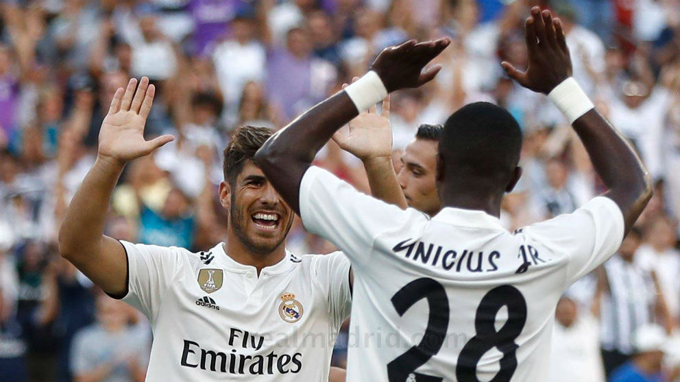 Asensio y Vinicius celebran un gol. (Realmadrid.com)